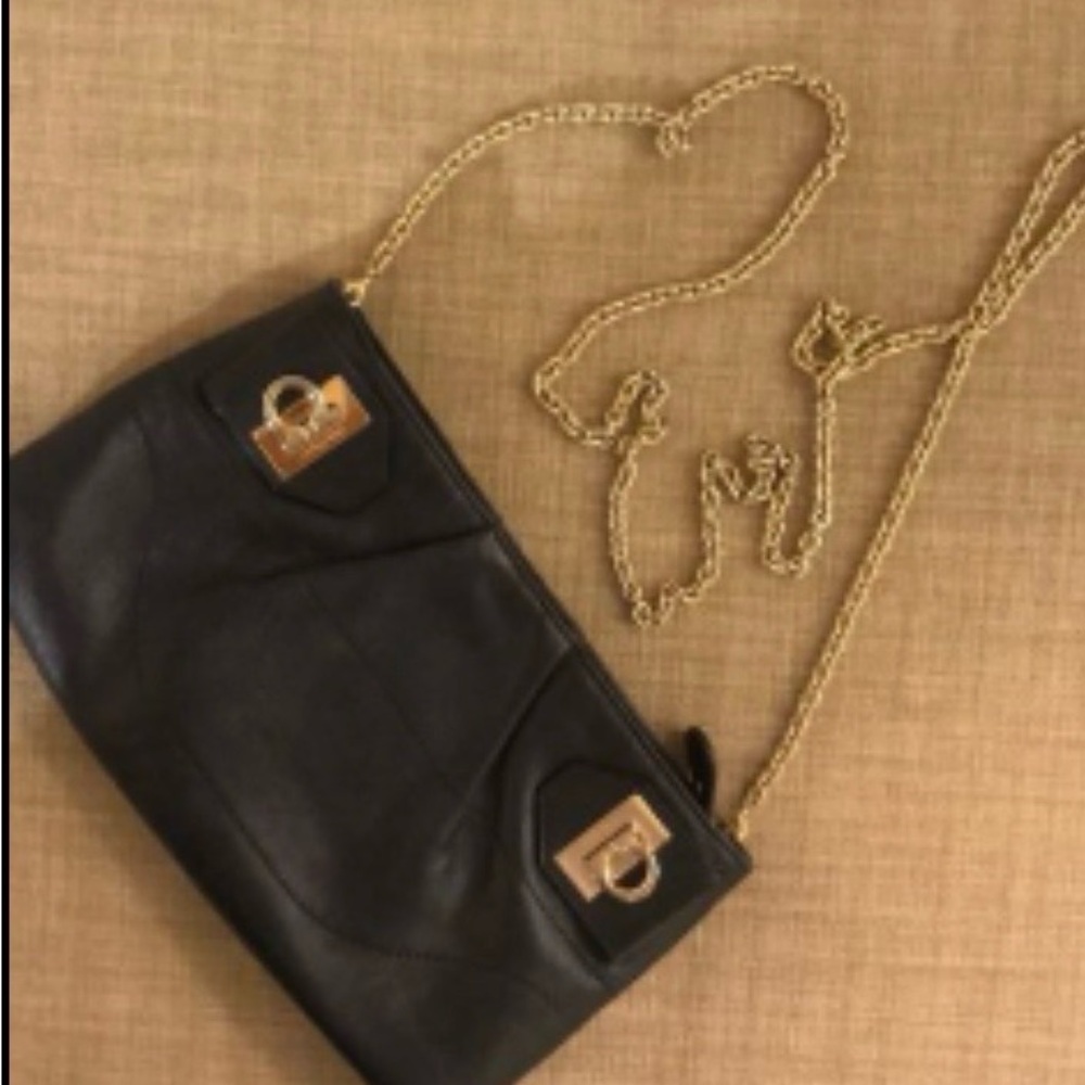 Salvatore Ferragamo black calf leather clutch with crossbody chain